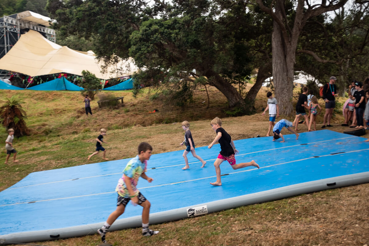 Kids enjoying the bouncy waterslide (We may or may not have had a go too). Photo: Alex Blackwood. 